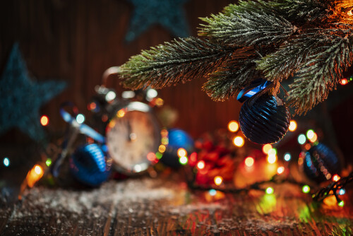 Chriatmas card with blu balls and lights, selective focus